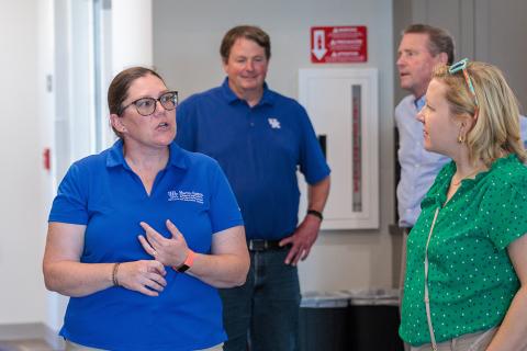 group of people touring construction of the Grain and Forage Center of Excellence at the University of Kentucky Research and Education Center at Princeton.